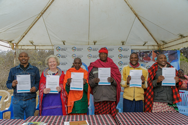 From left Dr. Elifuraha Laltaika, EACOP’s Advisor on Vulnerable Ethnic Groups Self-Identifying as Indigenous Peoples, Wendy Brown, EACOP Tanzania General Manager, Oring’idi Masunyu, Akie Laigwanan who currently hosts an Akie sacred site recently relocated, Pasinai Oltingi, Harmlet Chairman, Yohanna Lemama, Akie Village Chairperson and Elias Rumas Olekitirie, Akie Community National Chaiperson. 